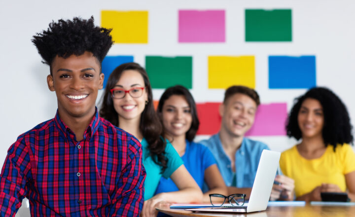 African american male student with group of international students